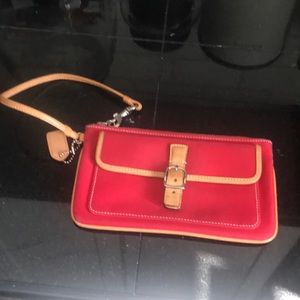 Super cute Coach wristlet.